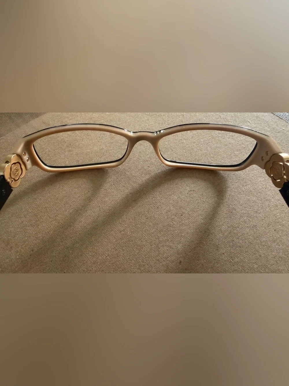 CHANEL Black Frames with Tan Inner Trim and Gold Flower with emblem on temples
